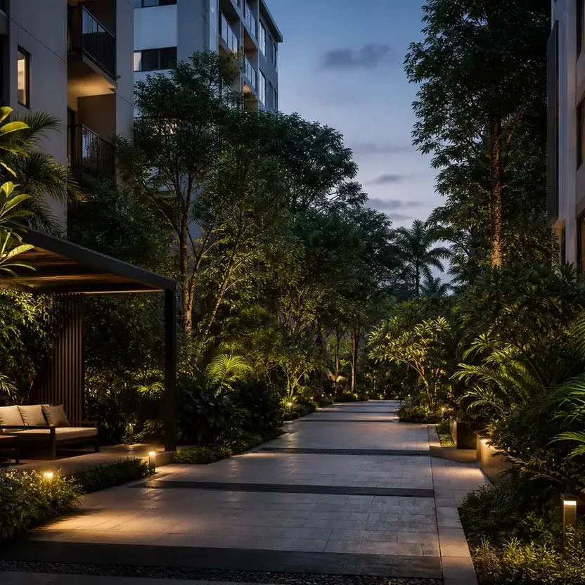 Prestige Kasavanahalli, artistic impression A lit promenade with a garden seat between the towers at evening